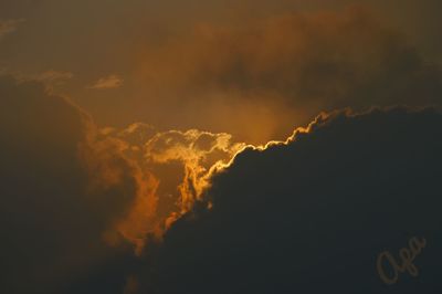 Low angle view of clouds in sky during sunset