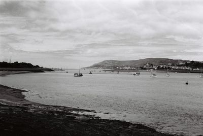 View of calm sea against cloudy sky