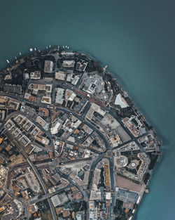 High angle view of illuminated buildings in city at night