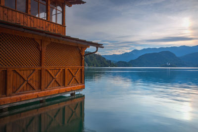 Scenic view of lake against sky during sunset