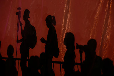 Silhouette people on stage