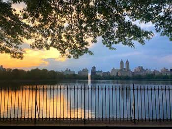 Scenic view of lake during sunset