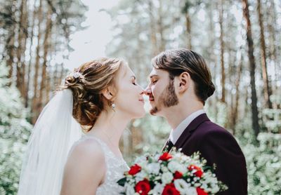 Couple kissing in park