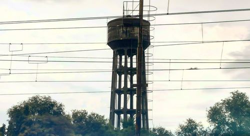 Low angle view of water tower against sky