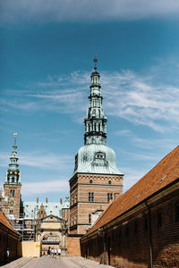 View of buildings against sky in city
