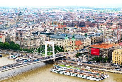 High angle view of river amidst buildings in city