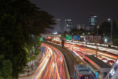 Light trails on city street at night