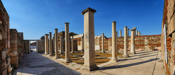 Old columns against blue sky