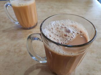 High angle view of coffee cup on table