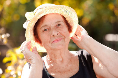 Smiling senior woman wearing hat