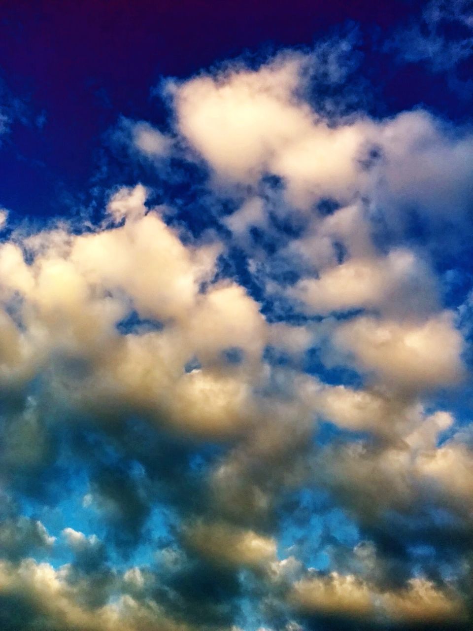 sky, sky only, cloud - sky, low angle view, beauty in nature, scenics, tranquility, cloudscape, tranquil scene, cloudy, nature, backgrounds, blue, cloud, idyllic, full frame, sunset, majestic, dramatic sky, weather