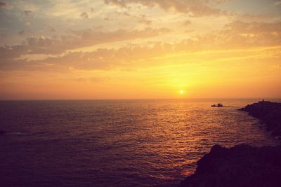 Scenic view of sea during sunset