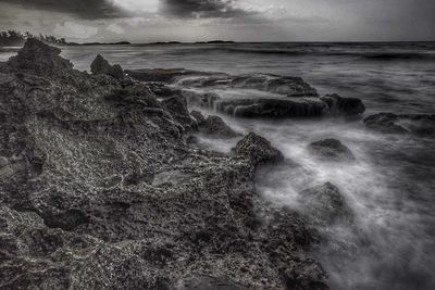 Waves splashing on rocks