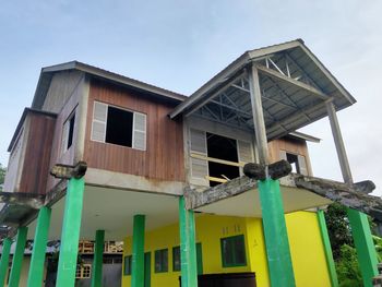 Low angle view of old building against sky