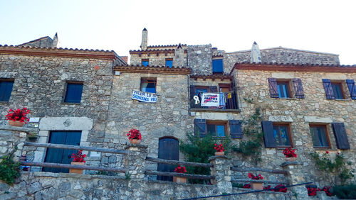 Low angle view of old building against sky