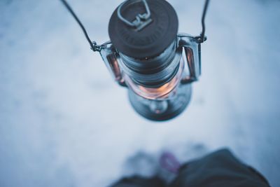 High angle view of lantern over snow