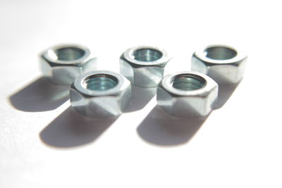 Close-up of glasses against white background