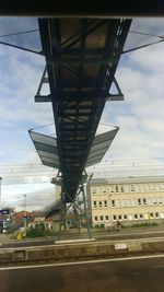 View of bridge against cloudy sky