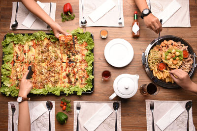 High angle view of person preparing food on table