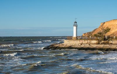 Old lighthouse karabush in the resort village of morskoe near odessa, ukraine, on a sunny spring day