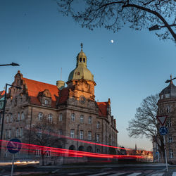 View of buildings against sky at dusk