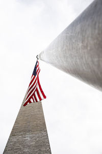 Low angle view of flag against clear sky