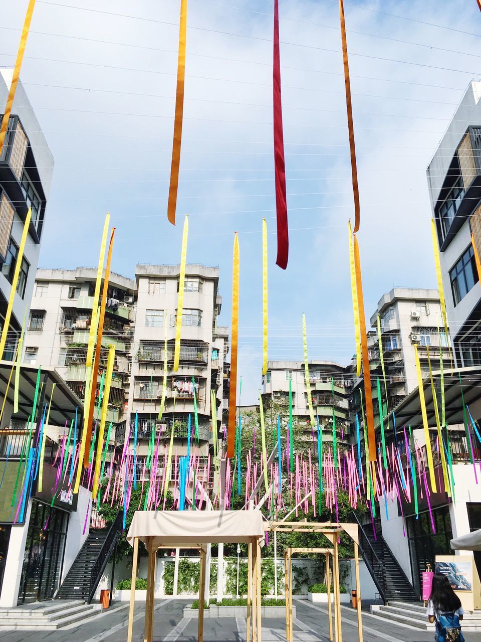 city, outdoors, architecture, amusement park ride, sky, amusement park, no people, day, flag