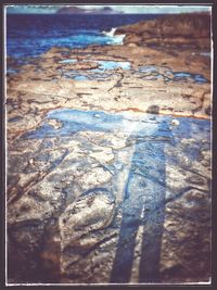 Close-up of water on beach