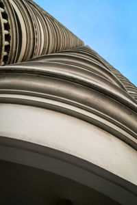 Low angle view of building against clear blue sky