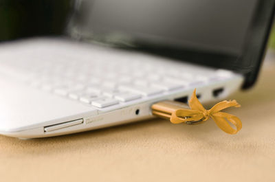 Close-up of laptop on table