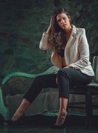 Portrait of young woman sitting in boat