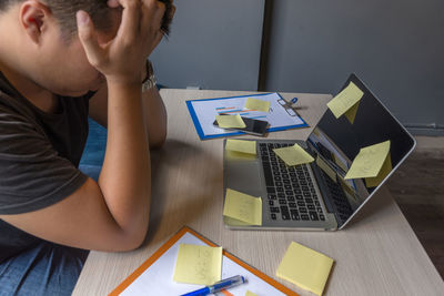 Tired businessman feel stressed about financial problem