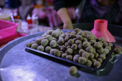 Close-up of fruits on table at market stall