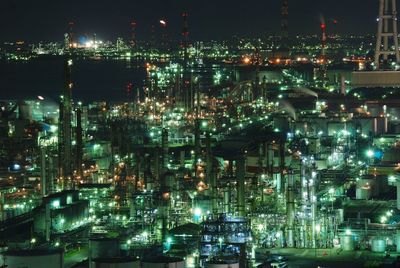 High angle view of illuminated built structures at night