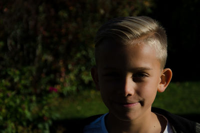 Close-up portrait of boy smiling