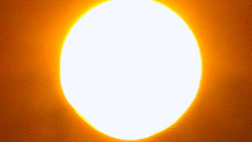 Full frame shot of bright light against clear sky