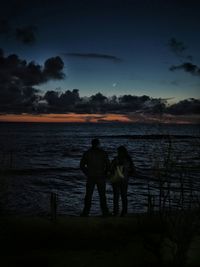 Scenic view of sea at sunset