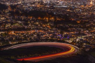 High angle view of illuminated cityscape at night