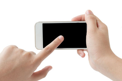 Midsection of person using smart phone against white background