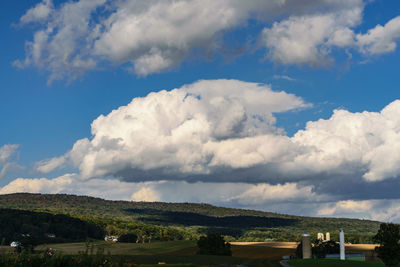 Panoramic view of landscape and buildings against sky