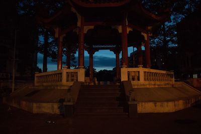 Low angle view of illuminated temple against sky