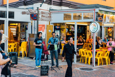 Group of people in front of building
