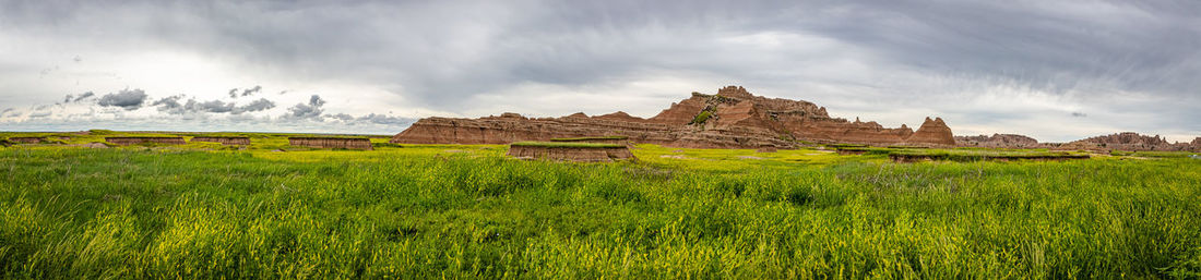 Panoramic view of castle on field against sky