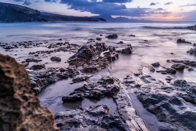 Scenic view of sea against sky during sunset