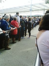 Low angle view of people on tiled floor