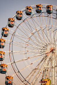 Closeup of multi-coloured giant wheel during dussehra mela in delhi, india. bottom view giant wheel