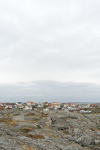 Buildings in city against sky