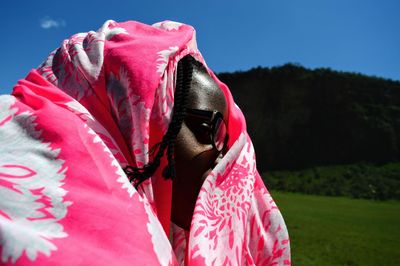 Close-up of woman wrapped in shawl