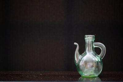 Close-up of glass jar on table