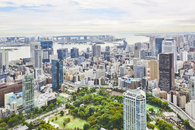 Aerial view of cityscape against sky